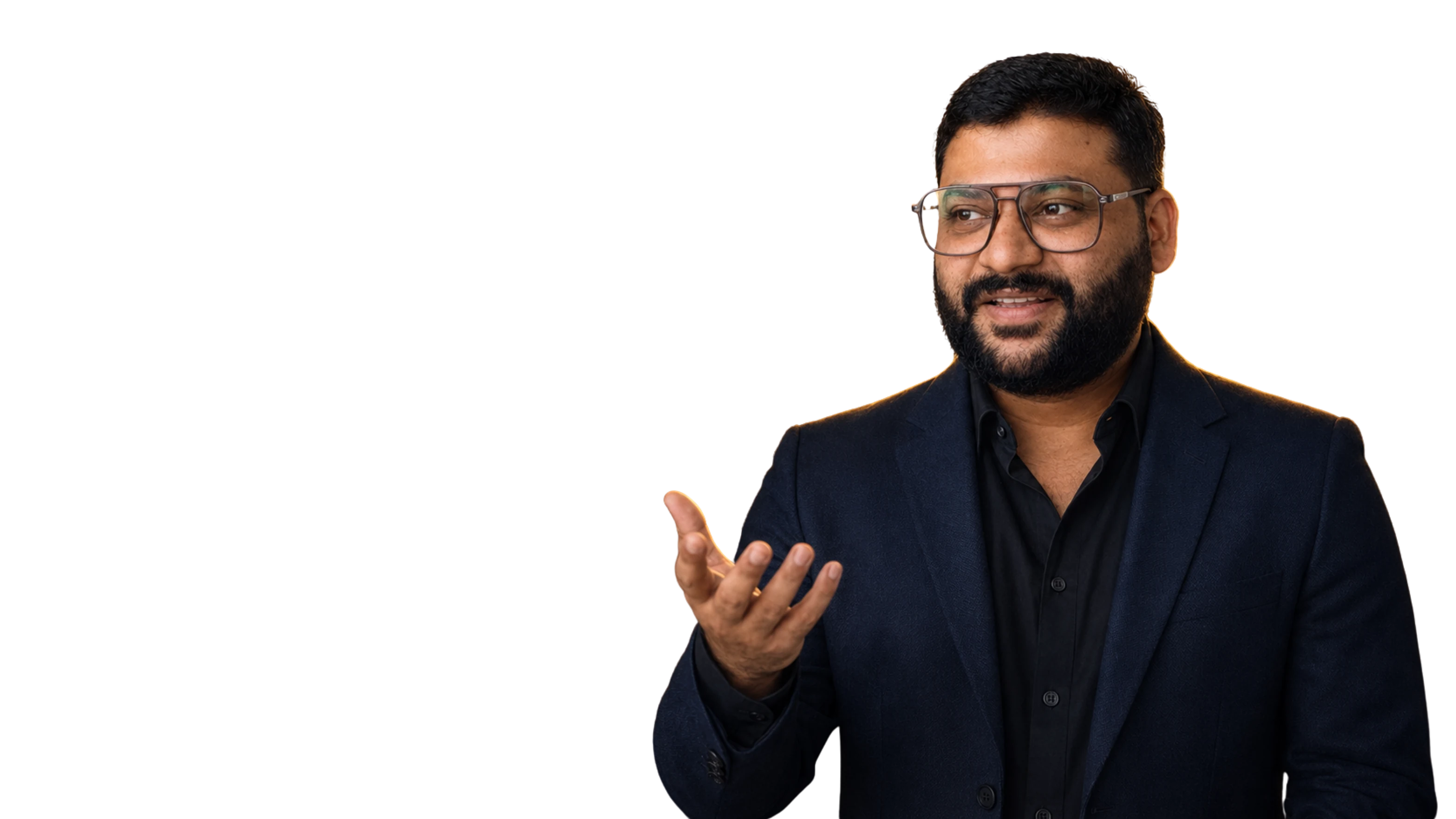 Laxman explaining an idea with an open hand gesture